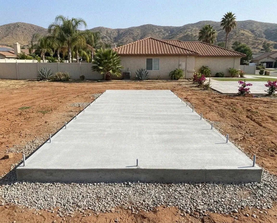 A new slab foundation waiting on the framer in Jurupa Valley